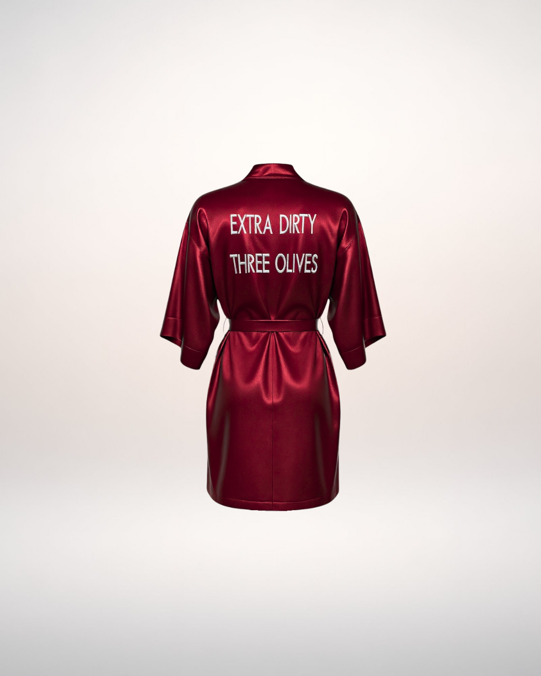 Red satin robe with 'Extra Dirty Three Olives' text on a white background